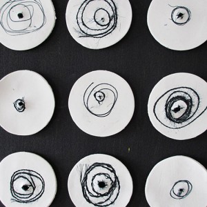 Bobbins: porcelain, thread imprints, paper